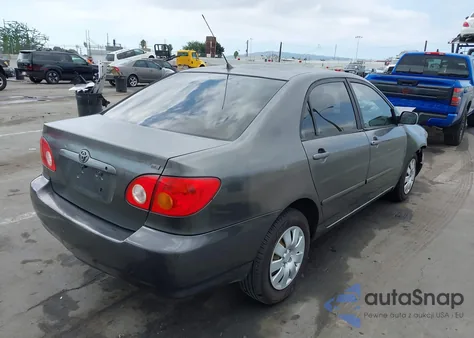2004 Toyota Corolla Le z USA, uszkodzony, nr VIN JTDBR32E542023776